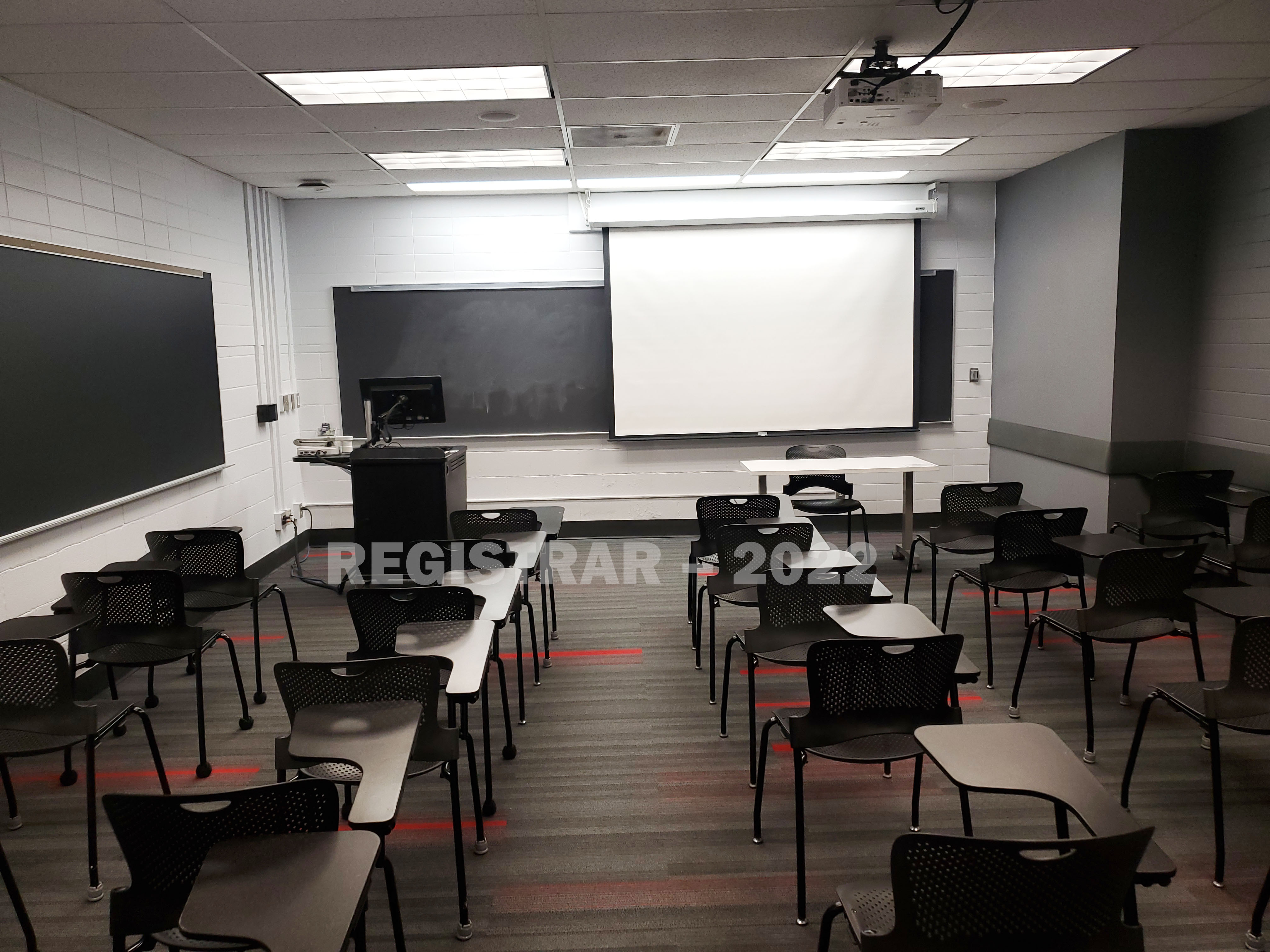 Baker Systems Engineering 130  view from the back of the room with projector screen down